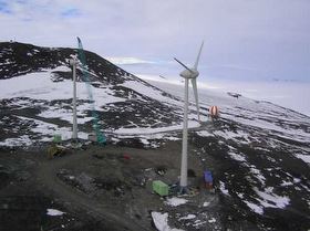 Ross Island wind farm in Antarctica with a crane erecting the second turbine
